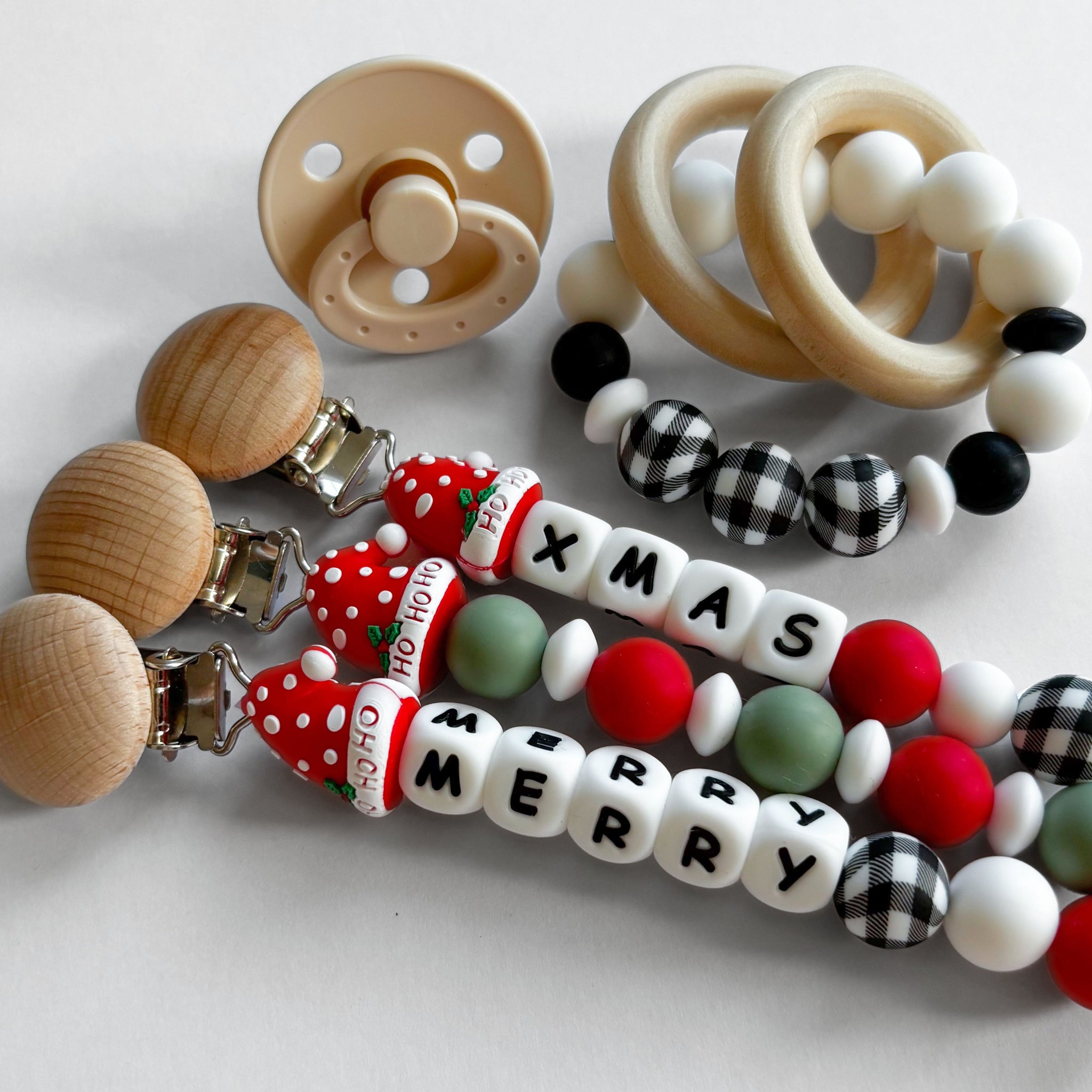 Santa Hat 'Ho Ho Ho' Christmas Pacifier Clips 🎄