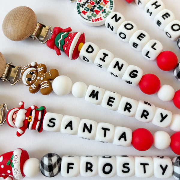 Santa Hat 'Ho Ho Ho' Christmas Pacifier Clips 🎄