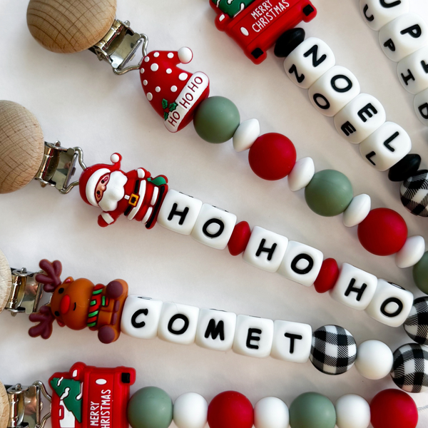 Santa Hat 'Ho Ho Ho' Christmas Pacifier Clips 🎄